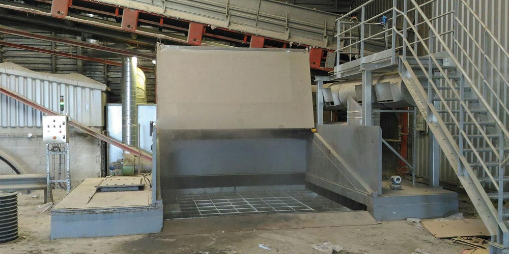 Sludge receiving bunker with typical Putzmeister A-fold lid