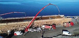 Putzmeister concrete pumps in use during the construction of the fixed road link between Oulu and Hailuoto